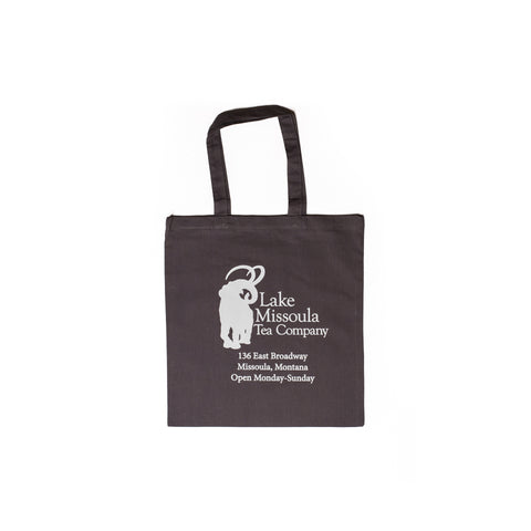 Lake Missoula Tea Company LMTC tote bag with durable fabric and logo design, perfect for carrying everyday essentials.