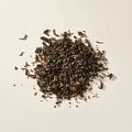 Big Sky Salted Caramel loose leaf tea: black tea, Milk Oolong and lavender buds on a cream background