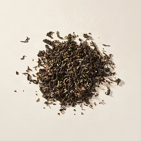 Big Sky Salted Caramel loose leaf tea: black tea, Milk Oolong and lavender buds on a cream background