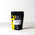 Loose leaf Scheherazade Shai tea from Lake Missoula Tea Company in a 75g package, showcasing fragrant tea leaves.