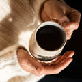 Square image of Irish Breakfast tea by Lake Missoula Tea Company, featuring a box with a rustic design and a cup of brewed tea.
