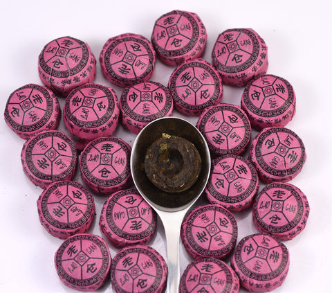 Sticky rice Puerh Tuocha tea from Lake Missoula Tea Company, showing compact, dark tea tuochas with sticky rice texture.