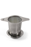 Lake Missoula Tea Company LMTC Steeper tea infuser resting on a dish, ideal for brewing loose leaf tea in teaware.