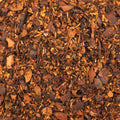 A close-up of Lake Missoula Tea Company's Chocolate Love tea with rich, textured chocolate-infused tea leaves.