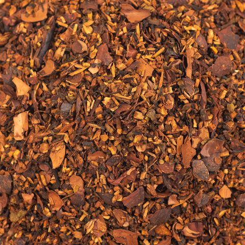 A close-up of Lake Missoula Tea Company's Chocolate Love tea with rich, textured chocolate-infused tea leaves.