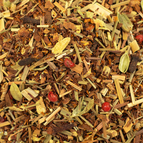 Close-up of Lake Missoula Tea Company's Evening Chai tea with rich, textured spices and tea leaves in a natural setting.