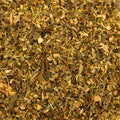 A cup of herbal headache relief tea from Lake Missoula Tea Company with a textured surface and calming presentation.