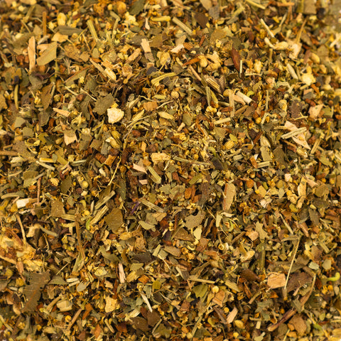 A cup of herbal headache relief tea from Lake Missoula Tea Company with a textured surface and calming presentation.