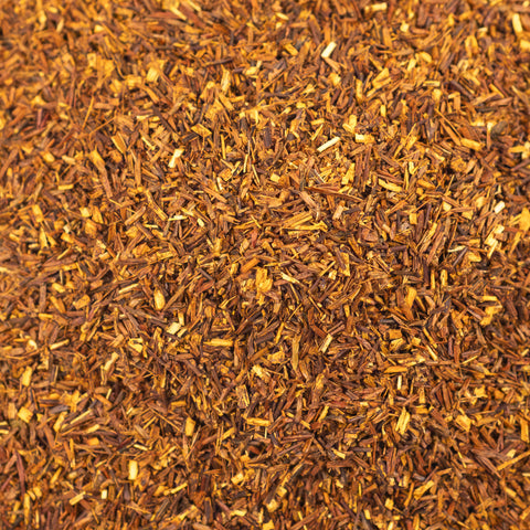 Close-up of Rugger's Rooibos tea from Lake Missoula Tea Company, showcasing its rich, textured dried tea leaves.