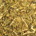 Close-up of Lake Missoula Tea Company's Stamina Tea leaves, showing textured dried tea leaves and herbal blend details.