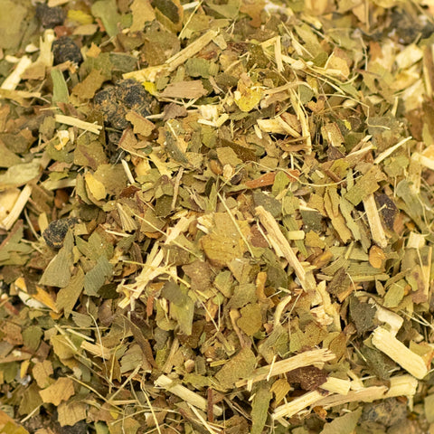 Close-up of Lake Missoula Tea Company's Stamina Tea leaves, showing textured dried tea leaves and herbal blend details.