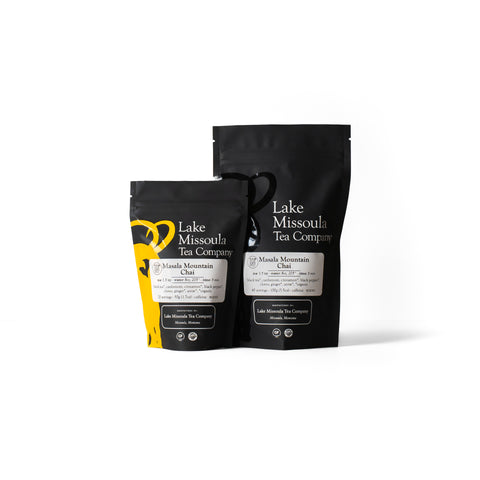 A cup of Masala Mountain Chai tea from Lake Missoula Tea Company, featuring a steaming cup with spices and tea leaves.