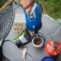 Sun-Kissed Huckleberry tea by Lake Missoula Tea Company, showcasing a vibrant tea blend with fresh huckleberries and herbal ingredients.