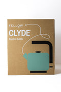 Cardboard packaging of a 'Fellow Clyde Electric Kettle' on a white background