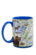 Montana ceramic mug featuring Xplorer Glacier maps, made by Lake Missoula Tea Company, with a scenic mountain and glacier design.