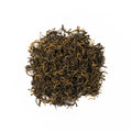 Golden Eyebrows Jin Jun Mei tea from Lake Missoula Tea Company, featuring dried tea leaves with golden tips and rich aroma.