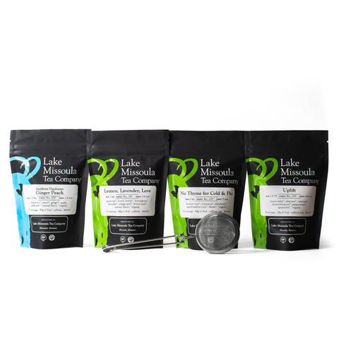 Lake Missoula Tea Company caffeine tea care package with assorted tea bags and packaging, ideal for tea lovers.