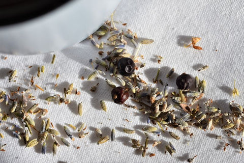 Loose leaf Gin & Cream Rooibos tea from Lake Missoula Tea Company with lavender and juniper botanicals in a close-up shot.