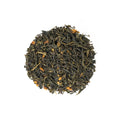 Tropical Fruit Green Tea by Lake Missoula Tea Company featuring vibrant green tea leaves and colorful tropical fruit pieces.