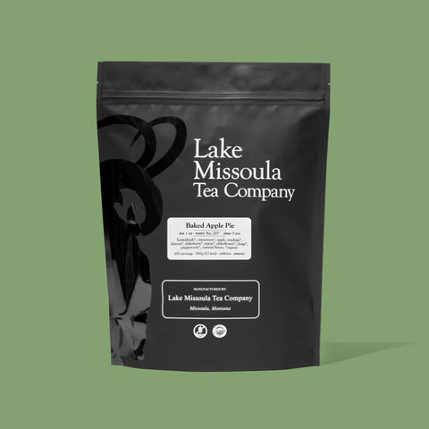 Lake Missoula Tea Company baked apple pie tea in a 500g package, featuring warm apple and spice flavors in a cozy tea blend.