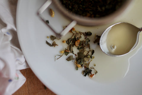 Lake Missoula Tea Company's "Beat the Snot Out of You" sinus tea in a jar with honey and herbs, designed to soothe congestion.