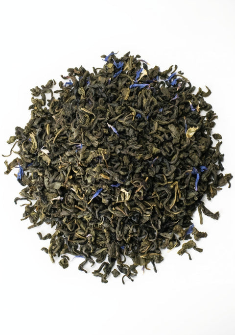 Loose leaf Blueberry Green tea from Lake Missoula Tea Company, featuring vibrant blue and green tea leaves with blueberry bits.