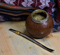 Yerba Maté tea from Lake Missoula Tea Company, showing a traditional gourd with yerba mate leaves and a metal straw.