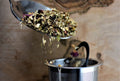 Sweet Rhapsody tea from Lake Missoula Tea Company, featuring a colorful blend of dried herbs and flowers in a clear jar.