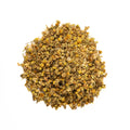 Cup of chamomile tea from Lake Missoula Tea Company, featuring fresh chamomile flowers and a steaming, soothing beverage.