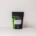 Lake Missoula Tea Company's Chamomile Calm tea in 2oz package, featuring dried chamomile flowers for relaxing herbal tea.