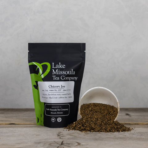 Dried Chicory Joe tea leaves from Lake Missoula Tea Company in a 2oz package, showcasing roasted, chopped chicory root for brewing.