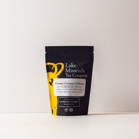 Creamy Coconut Oolong tea leaves from Lake Missoula Tea Company in a 2oz package, showcasing the tea's creamy coconut flavor.
