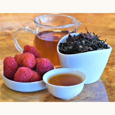 Loose leaf Raspberry Patch tea from Lake Missoula Tea Company featuring vibrant raspberry-infused tea leaves.