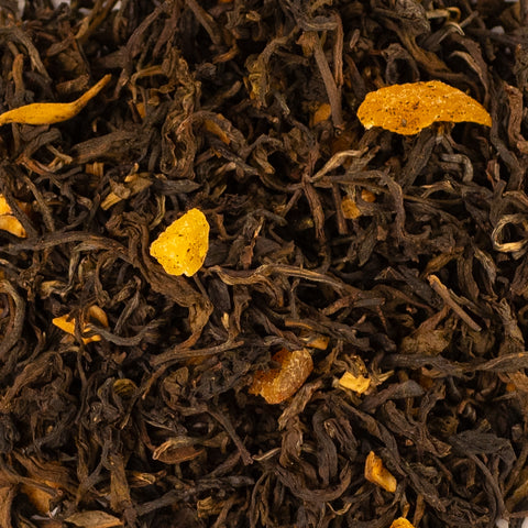 Dried apricot Puerh tea leaves from Lake Missoula Tea Company, showcasing their textured, ripe appearance ready for brewing.