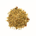 Spicy Ginger Snap tea by Lake Missoula Tea Company featuring a steaming cup with ginger and spice accents.