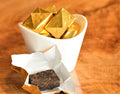 Golden Brick Puerh tea from Lake Missoula Tea Company, showing pressed golden-brown tea bricks with a textured surface.
