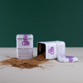 Mushies’ Instant Cup™ tea by Lake Missoula Tea Company, showing the tea cup with tea infusion and packaging in the background.