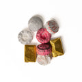 Assorted Puerh tea sampler from Lake Missoula Tea Company with multiple tea leaves and packaging visible.