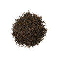 Decaf Black tea from Lake Missoula Tea Company, featuring a dark brewed cup with rich, black tea leaves.