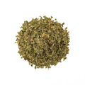Lemon Myrtle tea by Lake Missoula Tea Company showing dried lemon myrtle leaves in a clear glass jar.