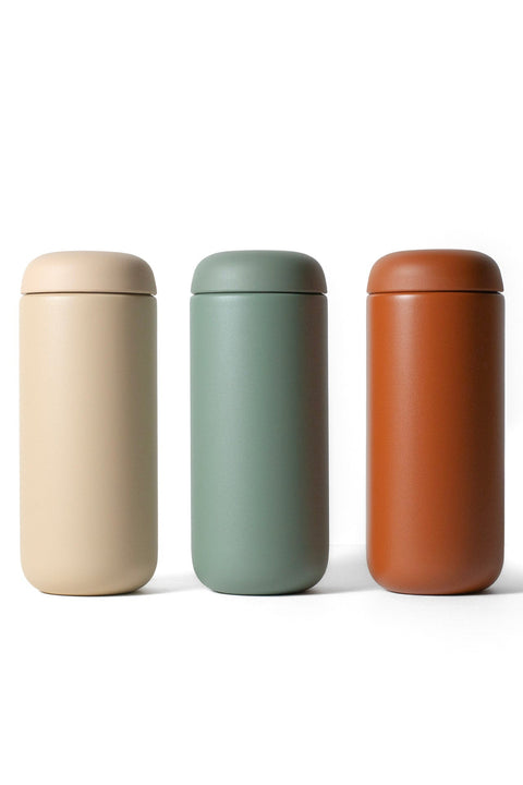 Fellow Carter Move travel mugs in three colors — sand, green, and terra cotta — shown side by side on white background