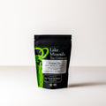 Lake Missoula Tea Company Genmai Cha tea in 2oz package, showing toasted rice and green tea leaves.