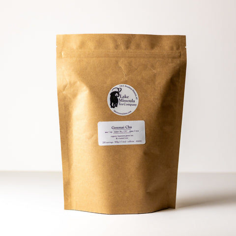 Loose dry Genmai Cha tea leaves from Lake Missoula Tea Company in a 500g package, showing toasted rice and green tea leaves.