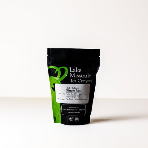 A 2oz package of Ginger Jazz tea from Lake Missoula Tea Company, featuring fresh ginger root and tea leaves on the packaging.