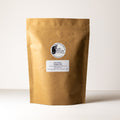 Lake Missoula Tea Company Ginger Jazz tea in a 500g package, showing fresh ginger root and tea leaves on the label.