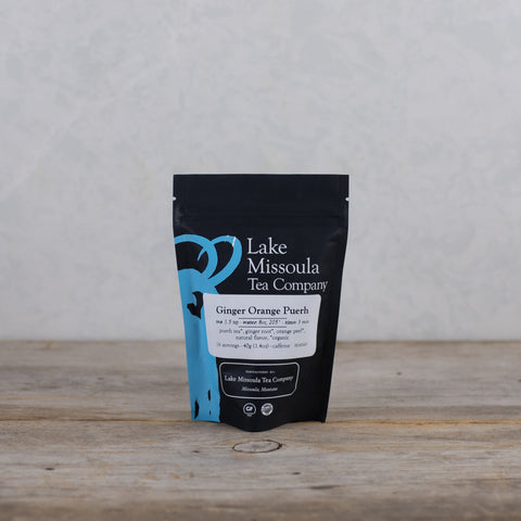 2oz Lake Missoula Tea Company Ginger Orange Puerh tea in a resealable pouch with fresh ginger and orange flavors.