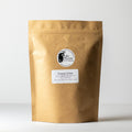 Ginseng Oolong tea by Lake Missoula Tea Company in a 500g package, featuring dried tea leaves with ginseng and oolong aroma.
