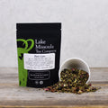 2oz bottle of Lake Missoula Tea Company hair care tea for scalp and hair health, with a natural herbal infusion in a clear bottle.