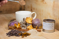 A cup of Mushies’ Instant Cup™ tea from Lake Missoula Tea Company with tea bag and steaming hot beverage in a cozy setting.