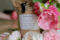 Cup of Rooibos Rose tea from Lake Missoula Tea Company, featuring a steaming mug of herbal tea with rose petals.
